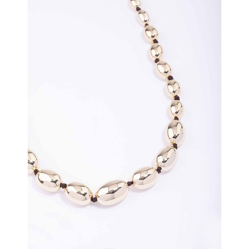 Gold Oval Bead Graduating Cord Necklace