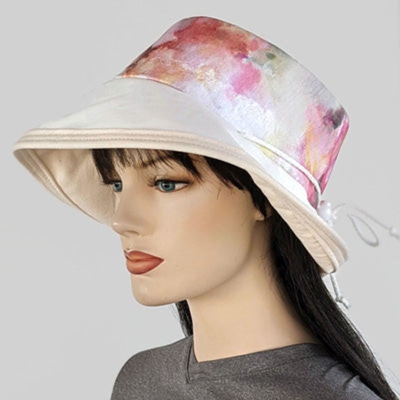 Sunblocker UV summer sun hat with wide brim, abstract floral watercolour inspired print, adjustable fit