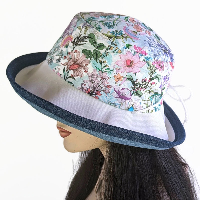 Sunblocker UV summer sun hat with wide brim, featuring pretty flowers, adjustable fit