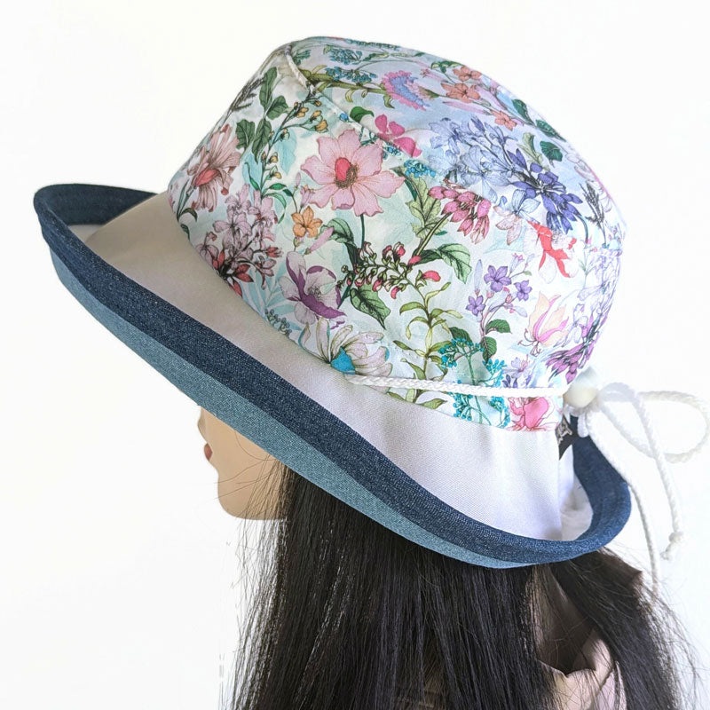 Sunblocker UV summer sun hat with wide brim, featuring pretty flowers, adjustable fit