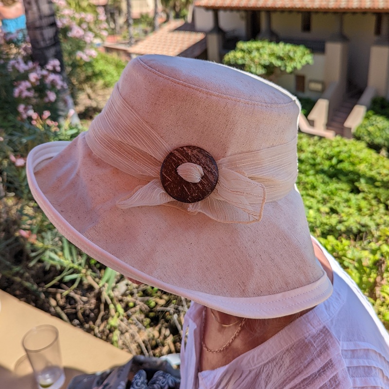 Stylish Extra wide brim sunblocker in cotton/flax and white canvas with shell buckle and textured scarf