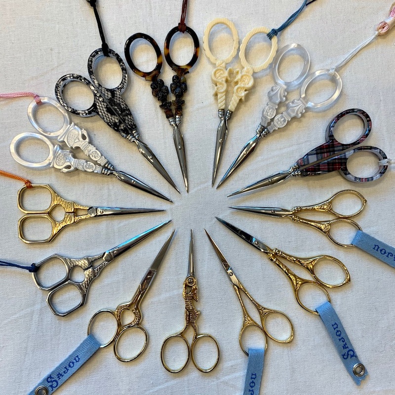 Sajou Scissors|Black Calais Lace|Veined Ivory (faux) “S”|Mother of Pearl “S”|Mother of Pearl Swan|Mother of Pearl – Original Style|Tartan Plaid|Tortoiseshell|Chromed Eiffel Tower|Gilded Eiffel Tower|Gilded Flower & Pearls|Gilded Hare|Gilded Heart|Gilded S