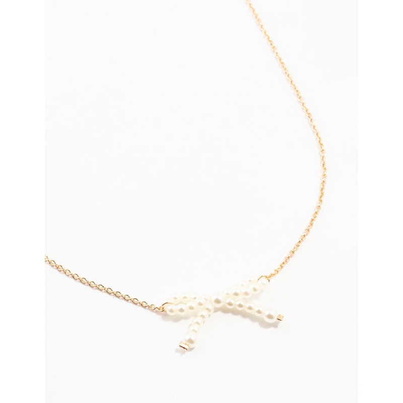 Gold Pearl Bow Necklace